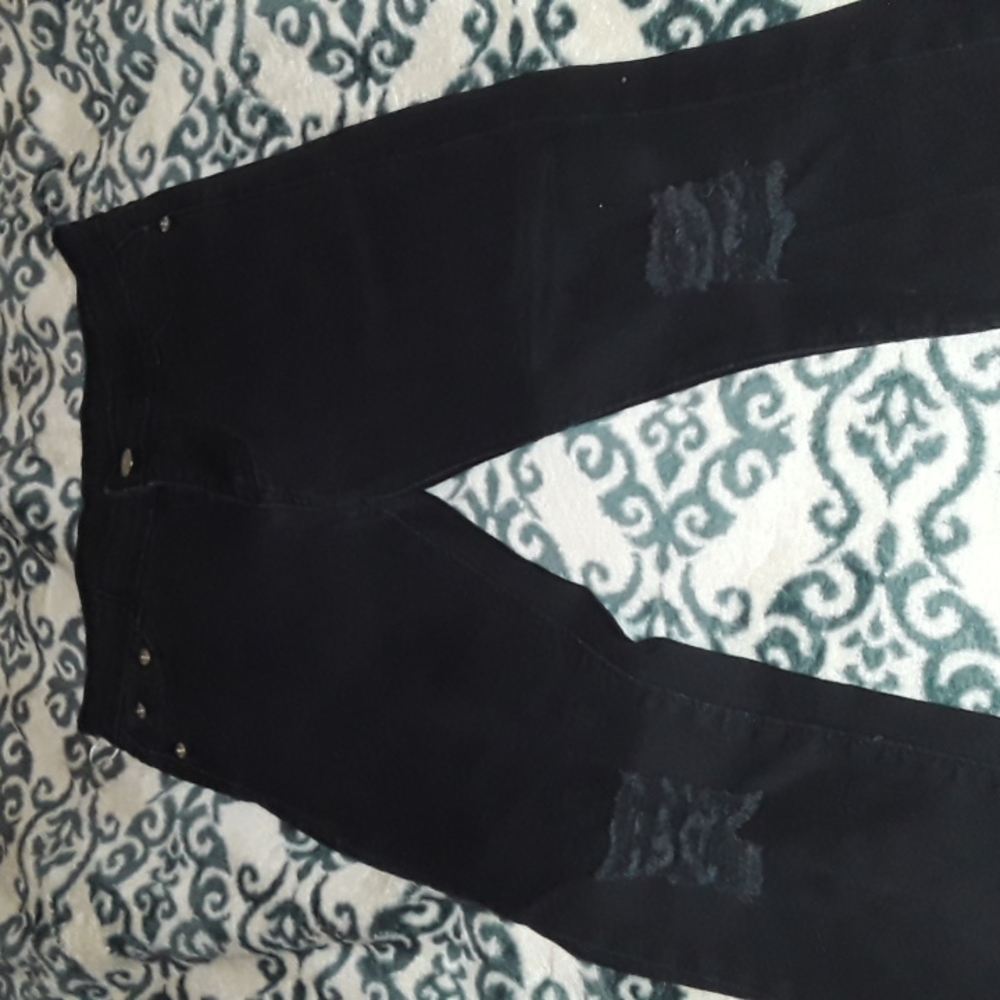 ripped black jeans
